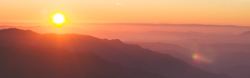 silhouette of mountain during golden hour